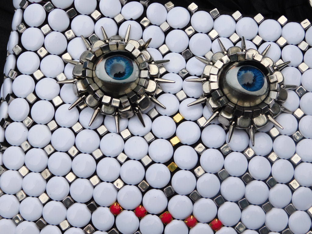 Solstice Surreal face Hand Bag