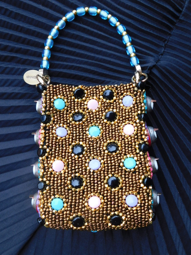 Solstice Hand Bag with doll eyes