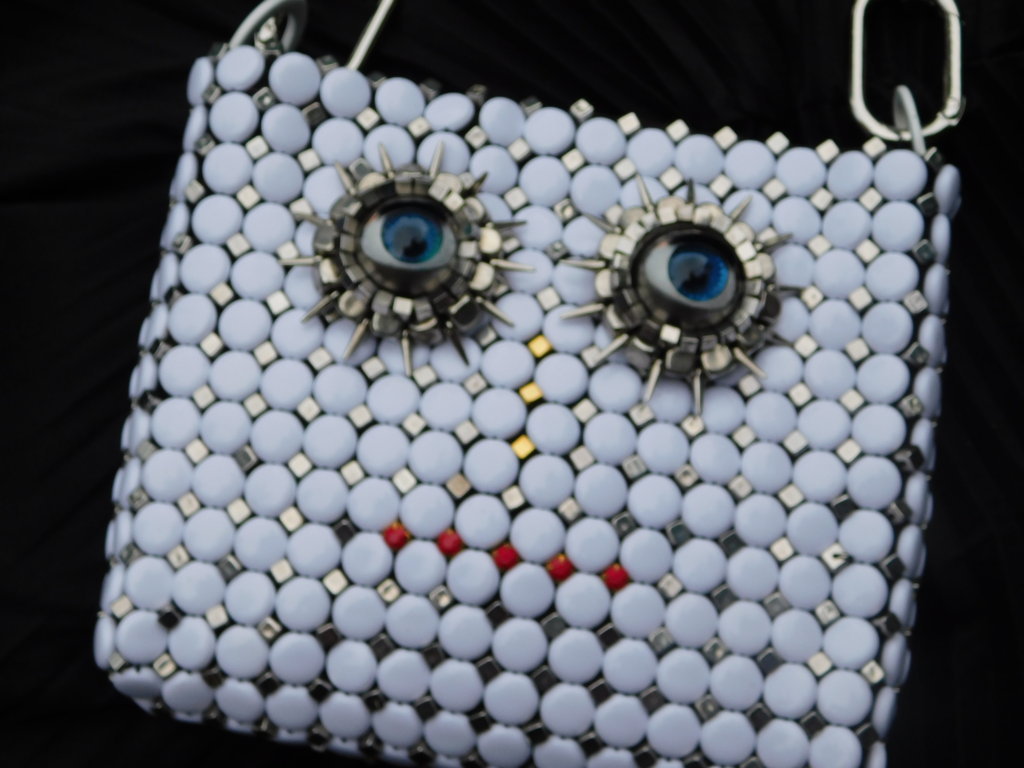 Solstice Surreal face Hand Bag