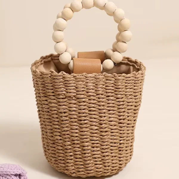 Boho 2026 New Handmade Beaded Handle Straw Woven Rattan Bucket Bag Large Capacity Soft Women's Travel Handbag