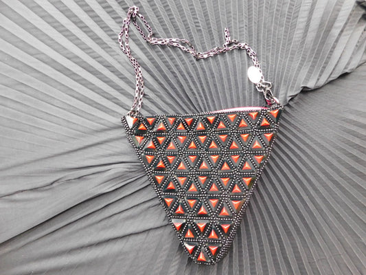 Solstice Luxury black and red triangular pyramids bag