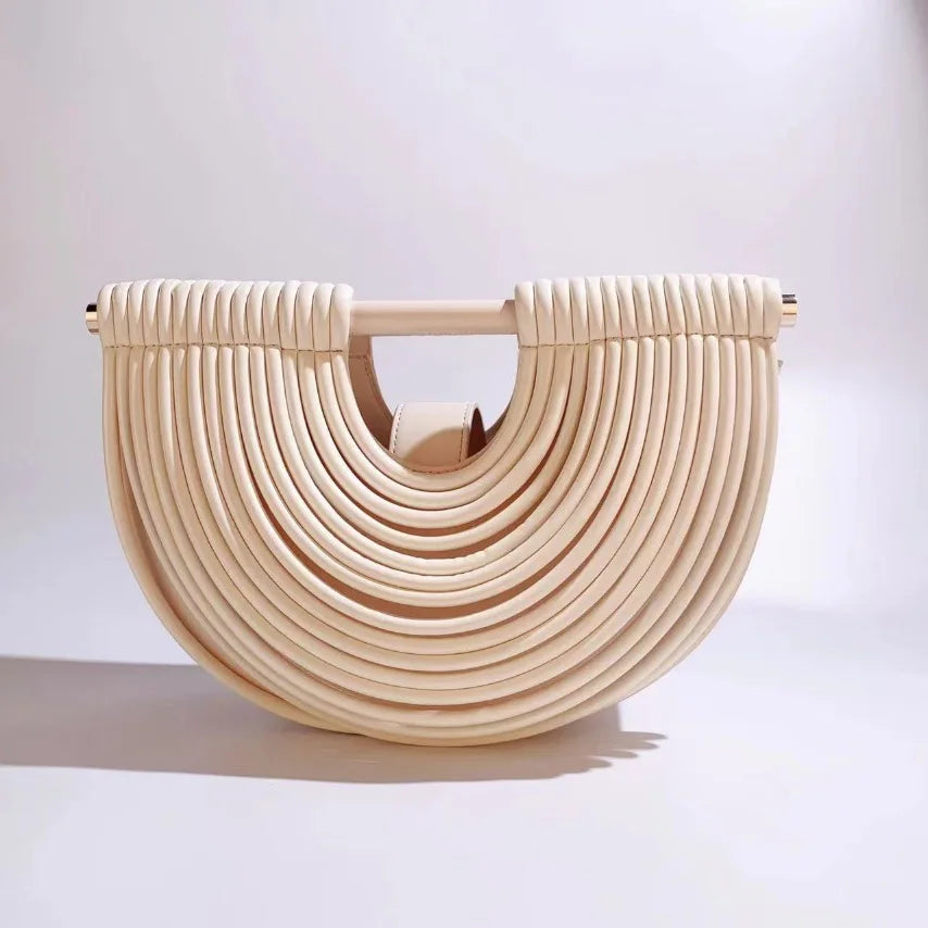 Beige woven handbag with a unique design on a white background