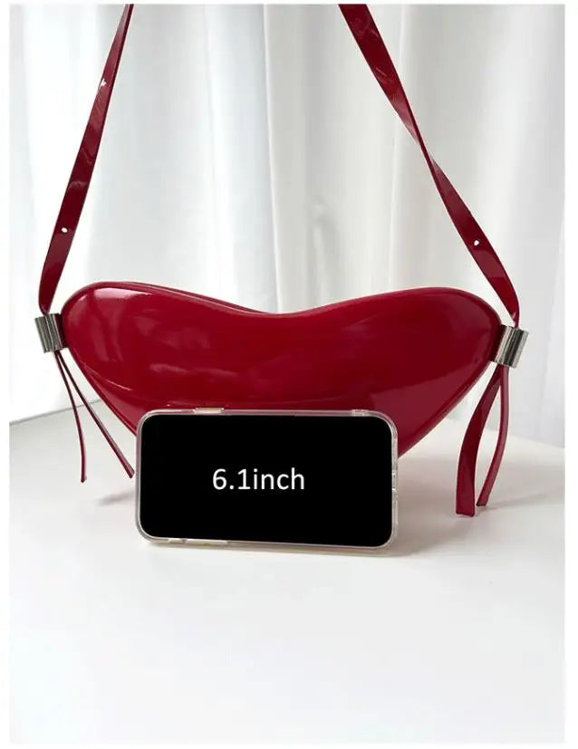 Red handbag with a smartphone displaying '6.1 inch' on a white background
