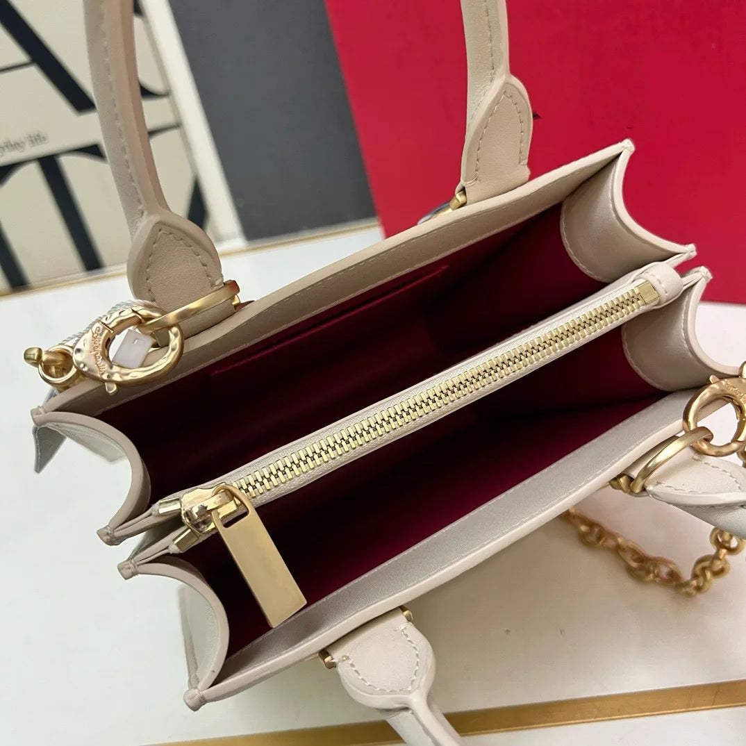 2026 Summer New Women's Surreal  Leather Handbag 3D Face Hand Grip Pattern Tote Bag Silver Patent Leather Square Versatile Shoulder Bag