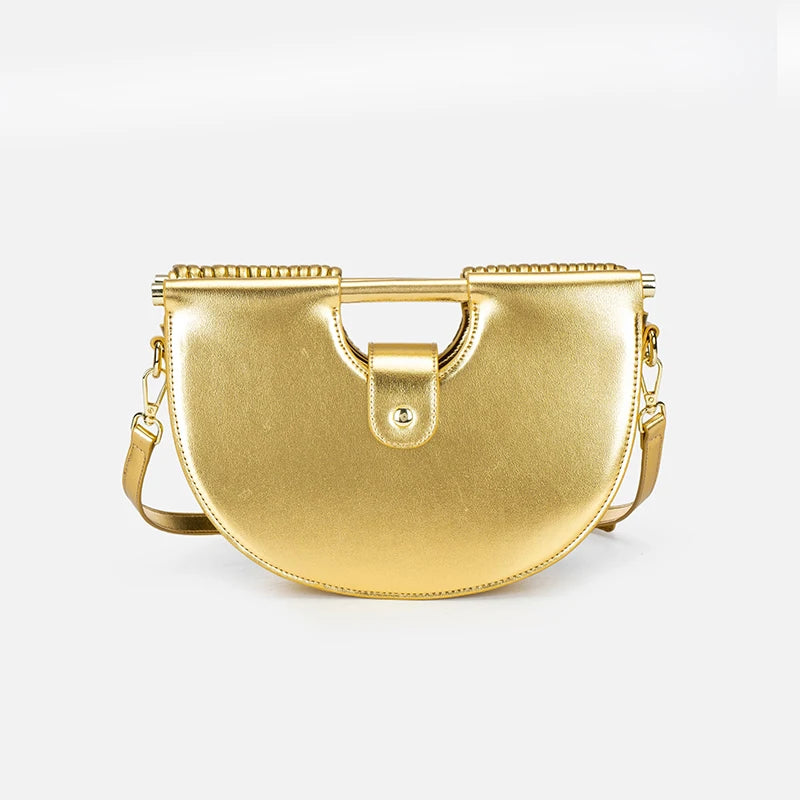 Gold handbag on a white background